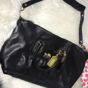 COACH purse black with purple interior.